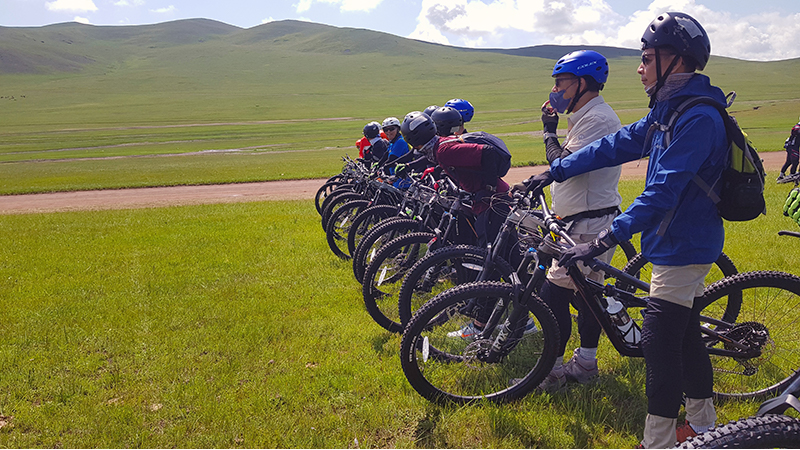 Giving a briefing for a cycling tour in Mongolia